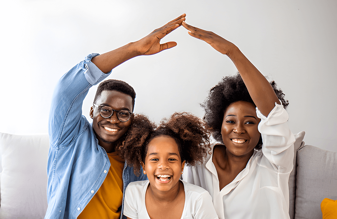 happy-family-forming-house-roof-with-their-hands-home-insurance-concept 1 (1) (1)